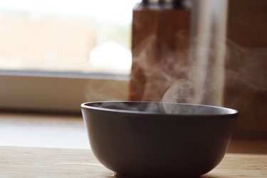 Hot steam rising from bowl