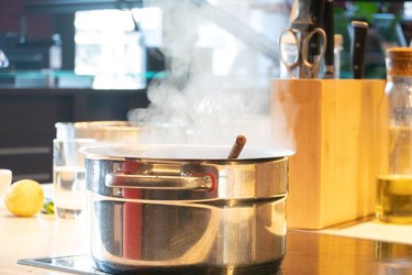 Steaming saucepan in the kitchen