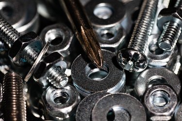 Pile of washers, nuts and screws