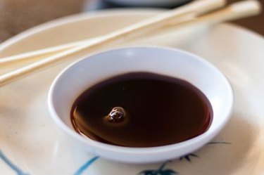 An image of a dish of soy sauce.