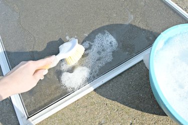 Use a soft scrub brush to lightly scrub away dirt and debris