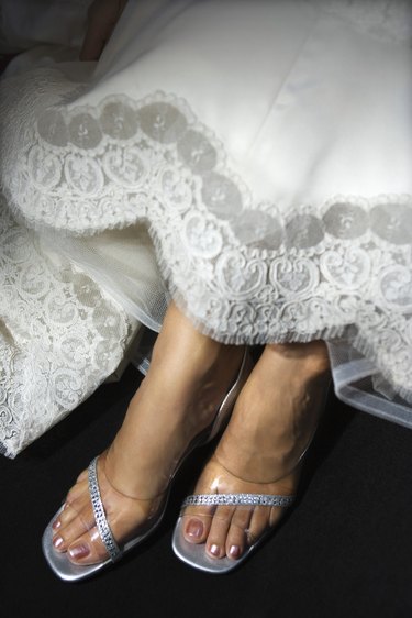 Feet of bride in gown