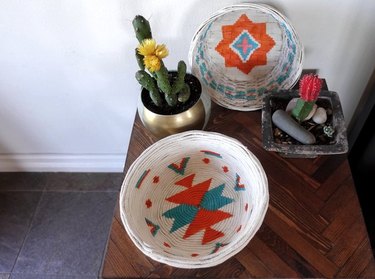 White, orange and teal woven basket.