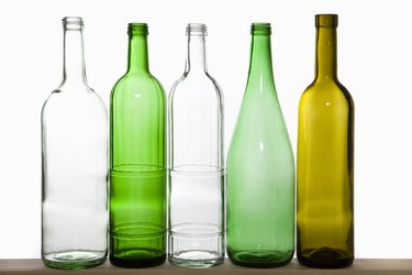 A row of recyclable glass bottles