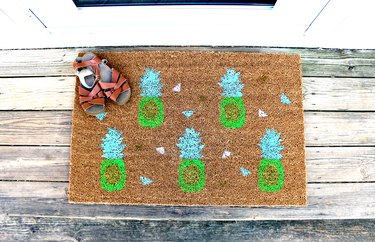 Pineapple doormat made with free stencil printable template.