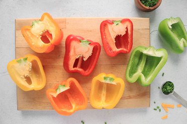 Cut bell peppers in half