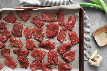Place beef on baking sheet