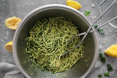 Toss pasta with kale pesto