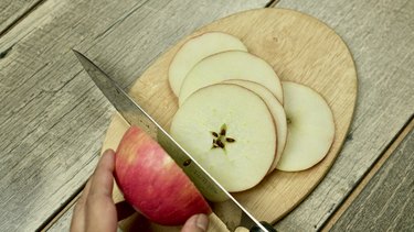 Slicing apples for Pumpkin Pie Punch Recipe