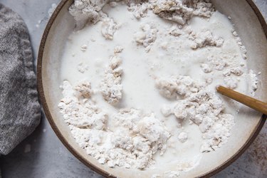Mixing bowl with flour, milk and butter for cobbler topping
