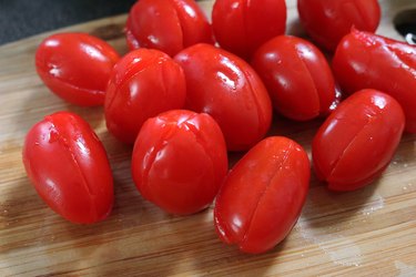 Cut the grape tomatoes