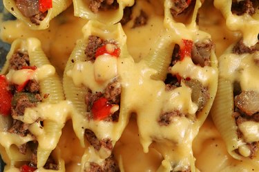 Fill jumbo pasta shells with beef filling