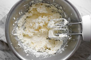 Beat cream cheese and butter together