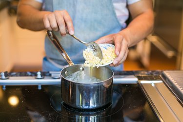 Combine the clarified butter & garlic cloves