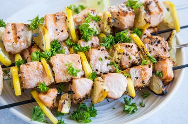 salmon skewers on a plate