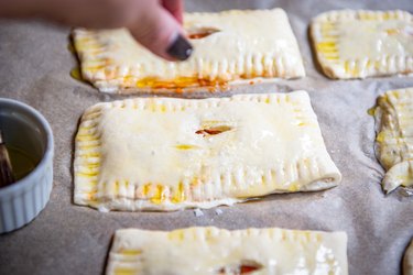 brush the pizza pockets