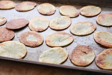 Baked chips on a baking sheet