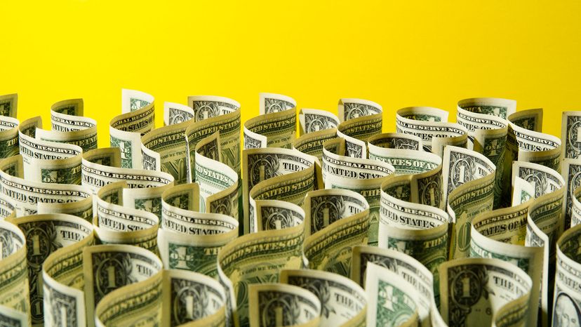 dollar bills on a yellow background