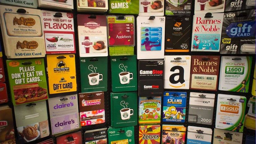 A lot of people give gift cards as presents during the winter holidays. Starbucks, for example, sold almost 2.5 million gift cards in the U.S. and Canada on Christmas Eve in 2014. Richard Levine/Corbis via Getty Images