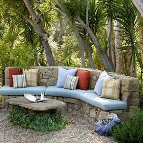 Bring a touch of the indoors out to create a cozy outdoor living space.