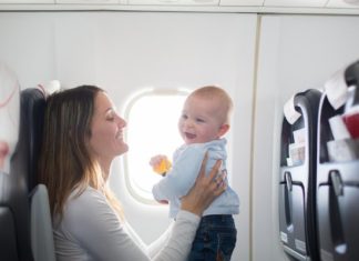 Baby’s First Flight: 27 Sanity-Saving Tips for Flying with a Baby